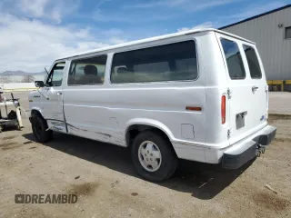 1989 Ford Econoline Cargo with VIN 1FTEE14Y2KHC41026, listed as a Copart auction lot 49440055 with 54,481 mi miles and Salvage Title. Bid and sale history available at DreamBid. Image 2.