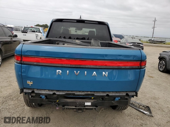 2023 Rivian R1T Launch Edition with VIN 7FCTGAAL7PN019188, listed as a Copart auction lot 55100405 with 13,654 mi miles and Salvage Title. Bid and sale history available at DreamBid. Image 6.