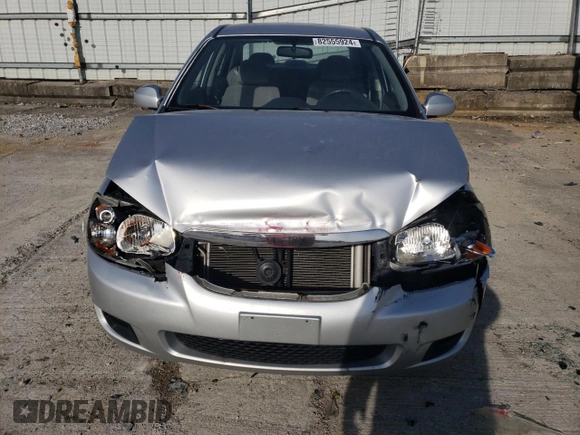 2009 Kia Spectra LX with VIN KNAFE221895659552, listed as a Copart auction lot 82555924 with 114,704 mi miles and Salvage Title. Bid and sale history available at carsss.com. Image 5.