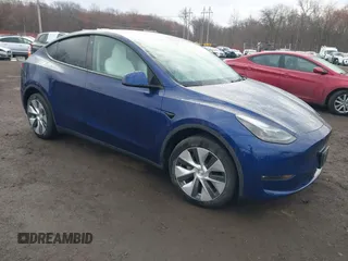 2023 Tesla Model Y Long Range z VIN 7SAYGDEE2PF694974, wystawiony jako IAAI lot #41814582 z przebiegiem 31 726 mil mil oraz . Historia ofert i sprzedaży dostępna na DreamBid. Obrazek 1.