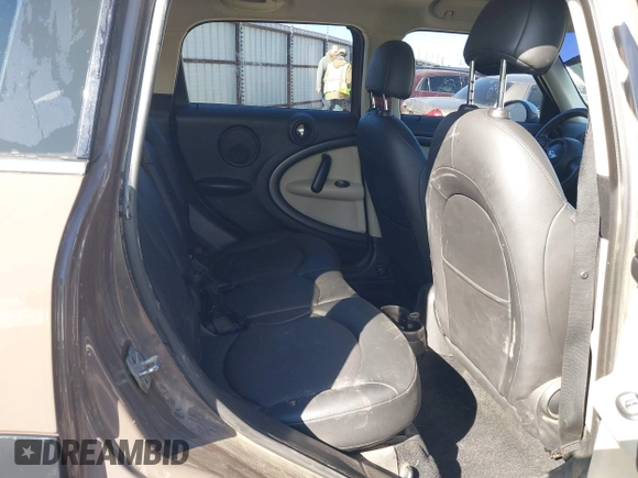 2014 MINI Countryman S with VIN WMWZC3C5XEWP52054, listed as a IAAI auction lot 41452354 with 104,873 mi miles and . Bid and sale history available at DreamBid. Image 8.