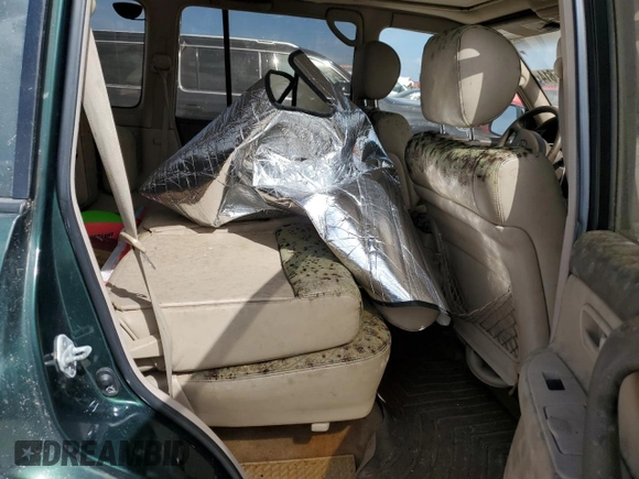 1999 Toyota Land Cruiser with VIN JT3HT05J9X0027448, listed as a Copart auction lot 77175814 with 0 mi miles and Salvage Title. Bid and sale history available at carsss.com. Image 11.