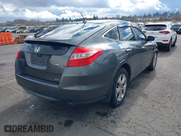 2012 Honda Crosstour EX-L z VIN 5J6TF2H52CL010520, wystawiony jako IAAI lot #41702638 z przebiegiem 177 464 mil mil oraz . Historia ofert i sprzedaży dostępna na DreamBid. Obrazek 4.