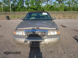 1999 Mercury Grand Marquis LS z VIN 2MEFM75W1XX703878, wystawiony jako IAAI lot #42074187 z przebiegiem 56 962 mil mil oraz . Historia ofert i sprzedaży dostępna na DreamBid. Obrazek 6.