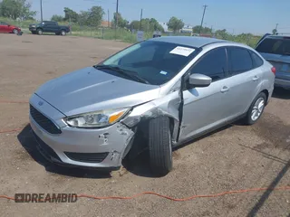 2018 Ford Focus SE z VIN 1FADP3FE0JL321530, wystawiony jako IAAI lot #42275532 z przebiegiem 65 412 mil mil oraz . Historia ofert i sprzedaży dostępna na DreamBid. Obrazek 17.