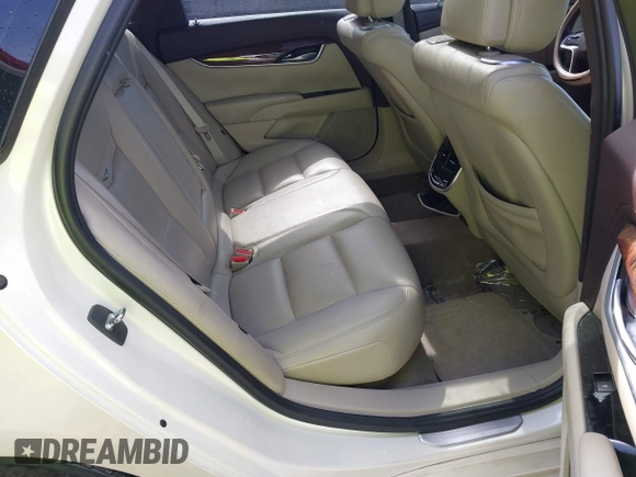 2013 Cadillac XTS Premium z VIN 2G61S5S35D9103948, wystawiony jako IAAI lot #42090444 z przebiegiem 154 728 mil mil oraz . Historia ofert i sprzedaży dostępna na DreamBid. Obrazek 8.