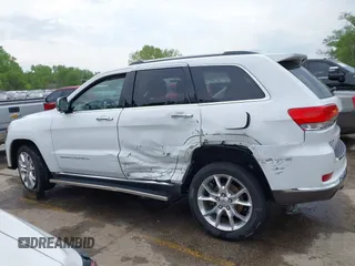 2015 Jeep Grand Cherokee Summit with VIN 1C4RJFJG5FC104087, listed as a IAAI auction lot 42100298 with 88,710 mi miles and . Bid and sale history available at DreamBid. Image 14.