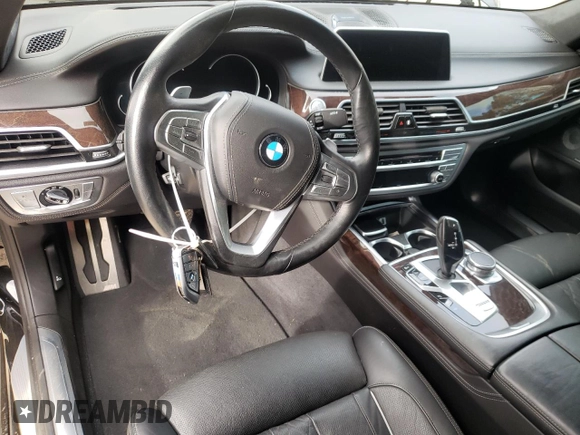 2016 BMW 7 Series 750i with VIN WBA7F0C5XGGL99017, listed as a Copart auction lot 84934504 with 0 mi miles and Salvage Title. Bid and sale history available at carsss.com. Image 8.