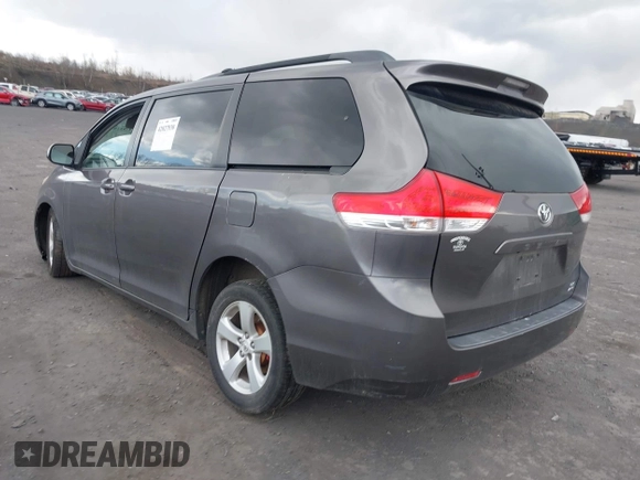 2013 Toyota Sienna LE with VIN 5TDJK3DC1DS049621, listed as a IAAI auction lot 42027930 with 206,148 mi miles and . Bid and sale history available at DreamBid. Image 3.