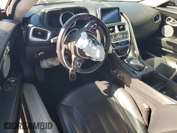 2018 Aston Martin DB11 z VIN SCFRMFAV1JGL05008, wystawiony jako Copart lot #77024394 z przebiegiem Nie podano mil oraz Szkody całkowita. Historia ofert i sprzedaży dostępna na DreamBid. Obrazek 8.