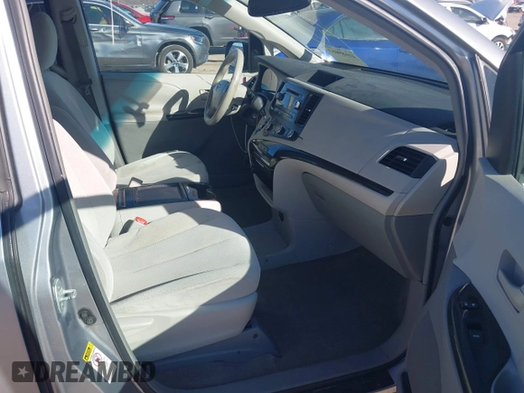 2011 Toyota Sienna LE AAS with VIN 5TDKK3DCXBS143921, listed as a IAAI auction lot 41689053 with 199,854 mi miles. Bid and sale history available at carsss.com. Image 5.