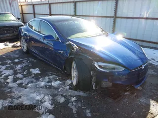 2020 Tesla Model S Long Range with VIN 5YJSA1E26LF410779, listed as a IAAI auction lot 41241192 with 68,764 mi miles. Bid and sale history available at carsss.com. Image 1.
