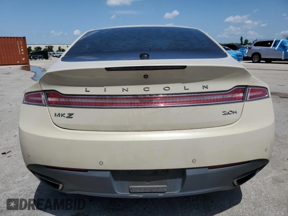 2014 Lincoln MKZ Hybrid z VIN 3LN6L2LU1ER821882, wystawiony jako Copart lot #62751275 z przebiegiem 260 413 mil mil oraz Nie do naprawy • Non repairable. Historia ofert i sprzedaży dostępna na DreamBid. Obrazek 6.