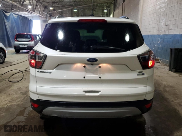 2017 Ford Escape SE with VIN 1FMCU9GD4HUA12697, listed as a Copart auction lot 51383765 with 145,122 mi miles and Clean Title. Bid and sale history available at carsss.com. Image 6.