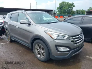 2014 Hyundai Santa Fe with VIN 5XYZUDLB8EG142971, listed as a IAAI auction lot 42647932 with 144,553 mi miles and . Bid and sale history available at DreamBid. Image 1.
