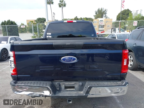 2023 Ford F-150 XL with VIN 1FTMF1C52PKG05729, listed as a IAAI auction lot 41685994 with 12,805 mi miles and . Bid and sale history available at carsss.com. Image 16.