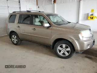 2011 Honda Pilot EX-L with VIN 5FNYF4H55BB010648, listed as a Copart auction lot 51094675 with 213,392 mi miles and Salvage Title. Bid and sale history available at DreamBid. Image 4.
