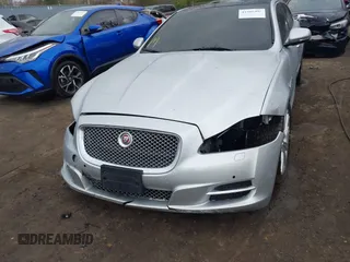 2015 Jaguar XJ with VIN SAJWA2GZ8F8V83551, listed as a IAAI auction lot 41909403 with 112,098 mi miles. Bid and sale history available at carsss.com. Image 6.