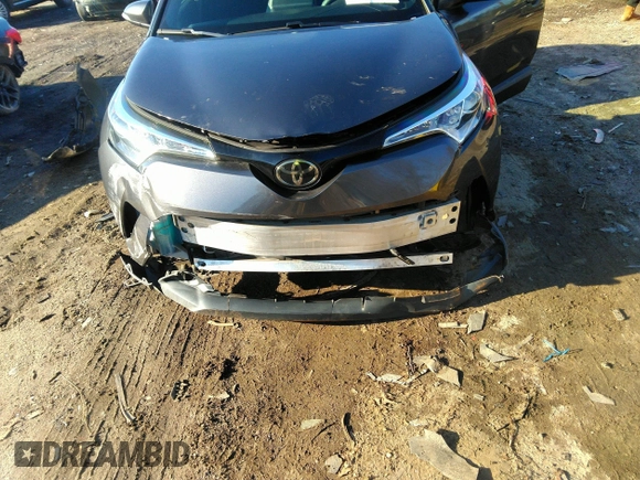 2019 Toyota C-HR XLE with VIN JTNKHMBX3K1034591, listed as a IAAI auction lot 40971538 with 135,200 mi miles. Bid and sale history available at carsss.com. Image 6.