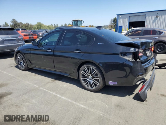 2018 BMW 5 Series 530e with VIN WBAJA9C50JB252458, listed as a Copart auction lot 58697585 with 89,050 mi miles and Salvage title. Bid and sale history available at DreamBid. Image 2.