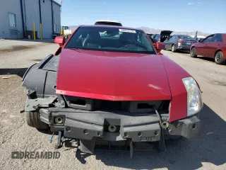 2004 Cadillac XLR z VIN 1G6YV34A345600127, wystawiony jako Copart lot #68859774 z przebiegiem 40 727 mil mil oraz Szkody całkowita. Historia ofert i sprzedaży dostępna na DreamBid. Obrazek 5.