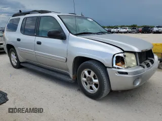 2005 GMC Envoy SLE with VIN 1GKES16S356104523, listed as a Copart auction lot 69112534 with 209,440 mi miles and Salvage Title. Bid and sale history available at DreamBid. Image 4.