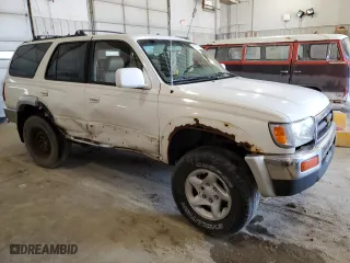 1998 Toyota 4Runner Limited with VIN JT3HN87RXW9017338, listed as a Copart auction lot 51928125 with 204,141 mi miles and Salvage Title. Bid and sale history available at carsss.com. Image 4.