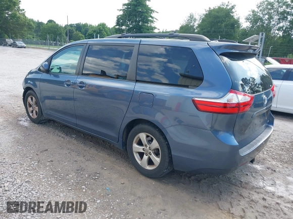 2015 Toyota Sienna LE AAS with VIN 5TDKK3DCXFS624984, listed as a IAAI auction lot 42560632 with 169,034 mi miles and . Bid and sale history available at DreamBid. Image 3.
