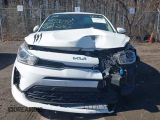 2022 Kia Rio S with VIN 3KPA25AD5NE458130, listed as a IAAI auction lot 41530395 with 33,154 mi miles and . Bid and sale history available at DreamBid. Image 13.
