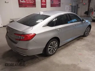 2018 Honda Accord Touring z VIN 1HGCV3F94JA001591, wystawiony jako IAAI lot #42161624 z przebiegiem 100 591 mil mil oraz . Historia ofert i sprzedaży dostępna na DreamBid. Obrazek 4.