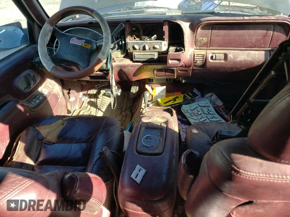1997 GMC Suburban z VIN 3GKFK16R3VG511306, wystawiony jako Copart lot #78504814 z przebiegiem 287 079 mil mil oraz Szkoda całkowita • Salvage title. Historia ofert i sprzedaży dostępna na DreamBid. Obrazek 8.