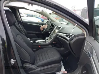 2014 Ford Fusion SE with VIN 1FA6P0H74E5392861, listed as a IAAI auction lot 42133099 with 130,373 mi miles. Bid and sale history available at carsss.com. Image 5.