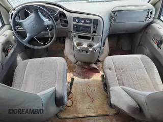 2000 Chevrolet Astro Cargo z VIN 1GCDM19W2YB128890, wystawiony jako Copart lot #59023315 z przebiegiem Nie podano mil oraz Szkoda całkowita • Salvage title. Historia ofert i sprzedaży dostępna na DreamBid. Obrazek 8.