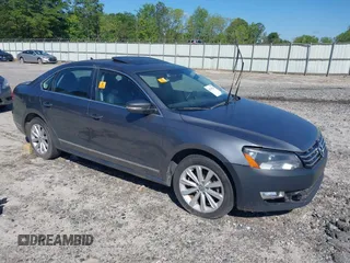 2013 Volkswagen Passat SEL Premium z VIN 1VWCP7A30DC131781, wystawiony jako IAAI lot #42193228 z przebiegiem Nie podano mil oraz . Historia ofert i sprzedaży dostępna na DreamBid. Obrazek 1.