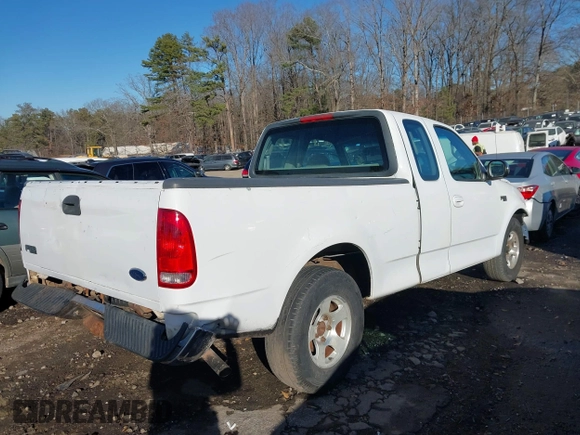 1999 Ford F-150 with VIN 1FTZX1728XNA81813, listed as a IAAI auction lot 41367154 with 149,103 mi miles and . Bid and sale history available at DreamBid. Image 8.