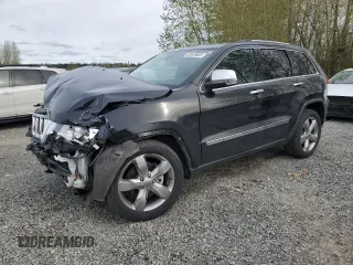 2013 Jeep Grand Cherokee Overland with VIN 1C4RJFCGXDC643802, listed as a Copart auction lot 52429535 with 122,014 mi miles and Salvage Title. Bid and sale history available at carsss.com. Image 1.