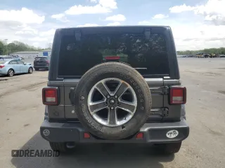 2019 Jeep Wrangler Unlimited Sahara with VIN 1C4HJXEN1KW504490, listed as a Copart auction lot 55633055 with 81,444 mi miles and Salvage Title. Bid and sale history available at DreamBid. Image 6.