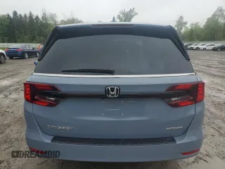 2024 Honda Odyssey Sport z VIN 5FNRL6H75RB057537, wystawiony jako Copart lot #57579345 z przebiegiem 6463 mil mil oraz Szkody całkowita. Historia ofert i sprzedaży dostępna na DreamBid. Obrazek 6.