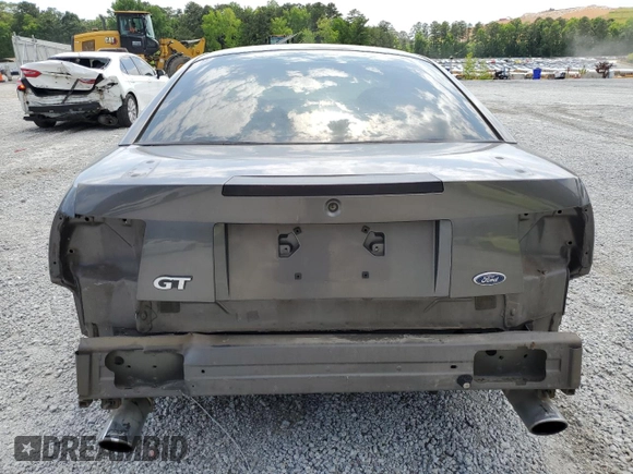 2003 Ford Mustang GT Deluxe with VIN 1FAFP42X13F392646, listed as a Copart auction lot 57938995 with 117,732 mi miles and Salvage title. Bid and sale history available at DreamBid. Image 6.