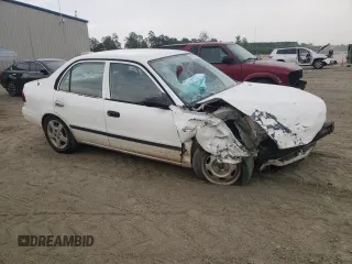 2000 Chevrolet Prizm z VIN 1Y1SK5281YZ415530, wystawiony jako Copart lot #60704824 z przebiegiem Nie podano mil oraz Szkody całkowita. Historia ofert i sprzedaży dostępna na DreamBid. Obrazek 4.