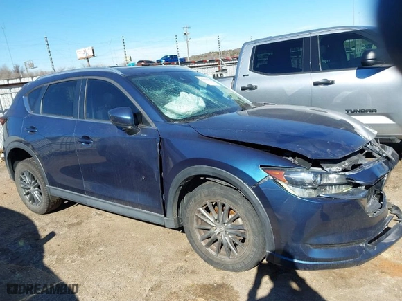 2019 Mazda CX-5 Touring with VIN JM3KFACM7K1654347, listed as a IAAI auction lot 41473542 with 101,297 mi miles. Bid and sale history available at carsss.com. Image 13.