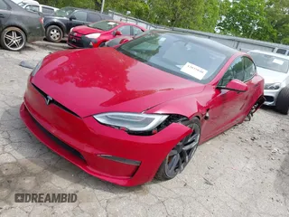 2022 Tesla Model S with VIN 5YJSA1E58NF470737, listed as a IAAI auction lot 42035040 with 15,224 mi miles and . Bid and sale history available at DreamBid. Image 21.