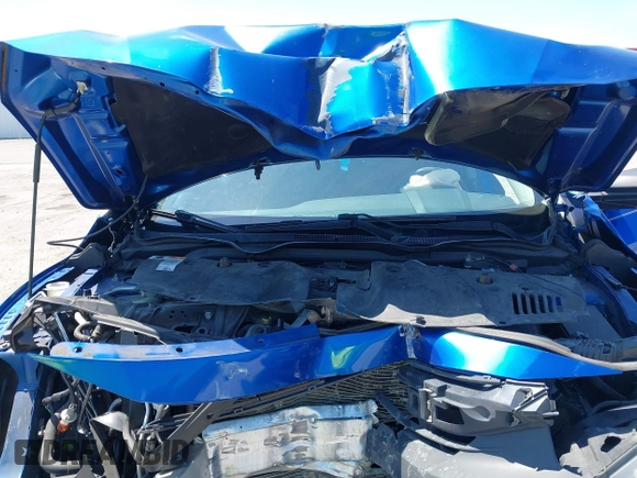 2018 Honda Civic LX with VIN 19XFC2F54JE027744, listed as a IAAI auction lot 42038398 with 119,250 mi miles and . Bid and sale history available at DreamBid. Image 10.