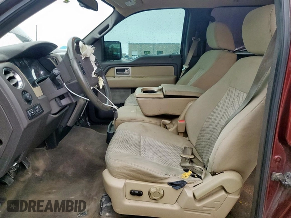 2009 Ford F-150 XL with VIN 1FTRW128X9FA32446, listed as a Copart auction lot 60648505 with 210,587 mi miles and Salvage title. Bid and sale history available at DreamBid. Image 7.