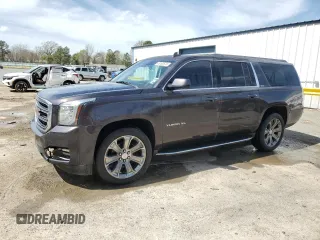 2015 GMC Yukon XL SLT with VIN 1GKS1HKC8FR551491, listed as a Copart auction lot 49183575 with 226,565 mi miles and Salvage Title. Bid and sale history available at carsss.com. Image 1.