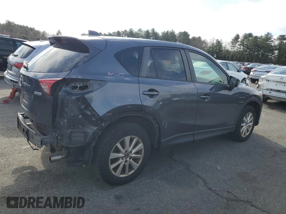 2013 Mazda CX-5 Touring with VIN JM3KE4CE2D0115012, listed as a Copart auction lot 49902355 with 239,562 mi miles and Salvage Title. Bid and sale history available at DreamBid. Image 3.