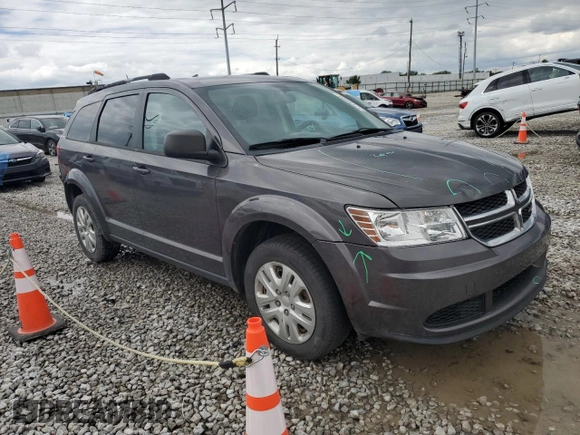 2017 Dodge Journey SE z VIN 3C4PDCAB1HT709104, wystawiony jako Copart lot #57132935 z przebiegiem 89 024 mil mil oraz Szkoda całkowita • Salvage title. Historia ofert i sprzedaży dostępna na DreamBid. Obrazek 4.
