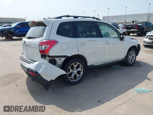 2016 Subaru Forester Touring z VIN JF2SJAVC2GH465083, wystawiony jako IAAI lot #42287323 z przebiegiem Nie podano mil oraz . Historia ofert i sprzedaży dostępna na DreamBid. Obrazek 4.