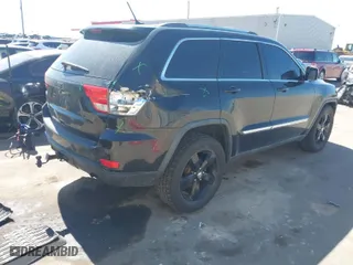 2011 Jeep Grand Cherokee Laredo with VIN 1J4RR4GG0BC656301, listed as a IAAI auction lot 41894106 with 95,293 mi miles. Bid and sale history available at carsss.com. Image 4.