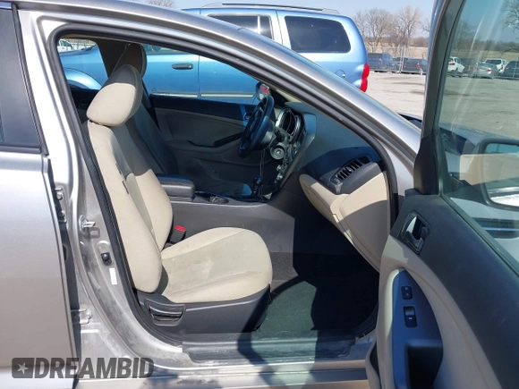 2015 Kia Optima LX with VIN 5XXGM4A78FG477630, listed as a IAAI auction lot 41771874 with 107,065 mi miles and . Bid and sale history available at DreamBid. Image 5.